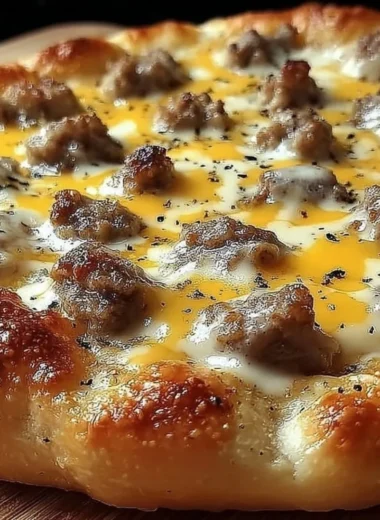 Delicious breakfast pizza topped with sausage gravy