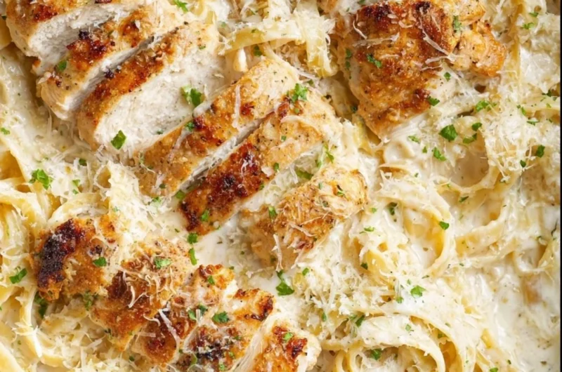 Creamy Chicken Fettuccine Alfredo served in a white bowl