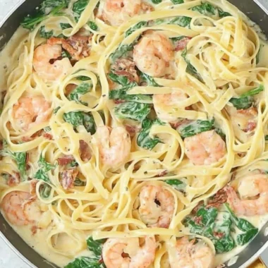 Delicious creamy Tuscan shrimp linguine served in a bowl