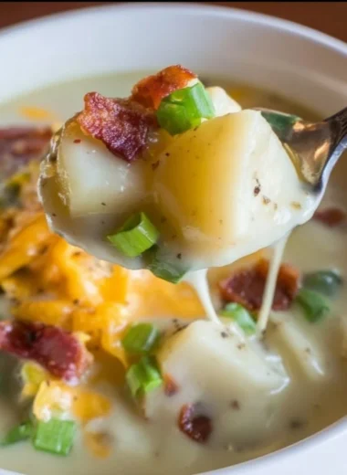 Delicious Crock Pot Loaded Baked Potato Soup with toppings