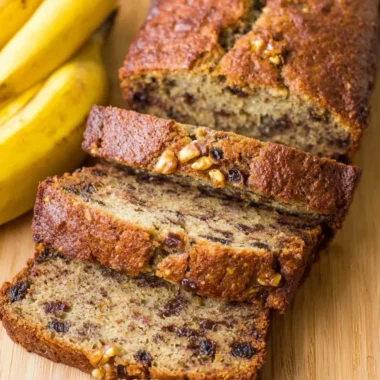 Delicious moist banana nut bread topped with walnuts