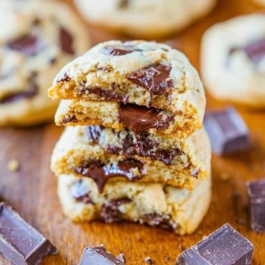 Freshly baked soft batch cookies on a cooling rack