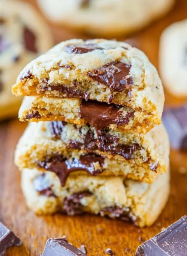 Freshly baked soft batch cookies on a cooling rack