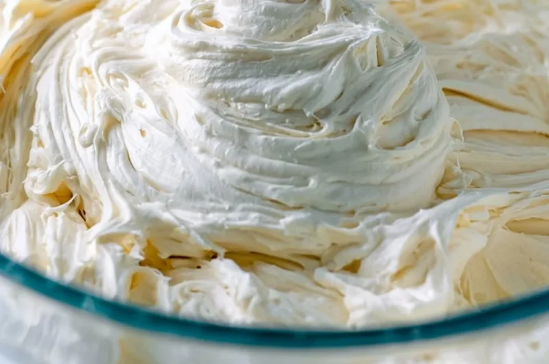 Deliciously creamy American Buttercream frosting on a cake