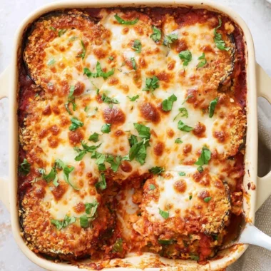 Healthy Baked Eggplant Parmesan with layers of cheese and sauce