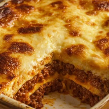 Delicious carnivore lasagna layered with meat, cheese, and rich sauce.