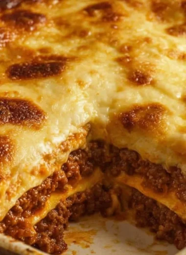 Delicious carnivore lasagna layered with meat, cheese, and rich sauce.