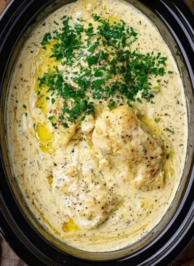 Delicious Crock Pot Angel Chicken served with vegetables on a plate