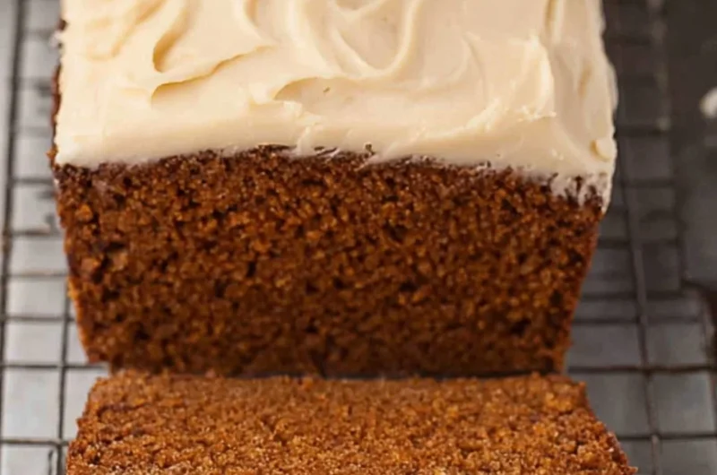 Delicious gingerbread loaf with a rich, spiced aroma and decorative icing