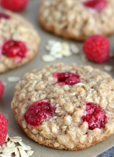 Freshly baked healthy raspberry oatmeal cookies on a cooling rack