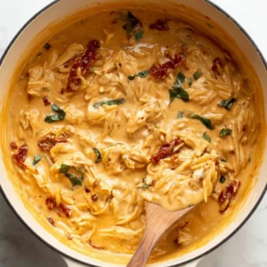 A delicious plate of Marry Me Chicken with herbs and creamy sauce