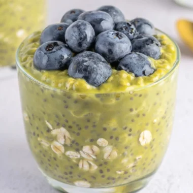 A bowl of Matcha Overnight Oats topped with fruits and nuts, a nutritious breakfast option.