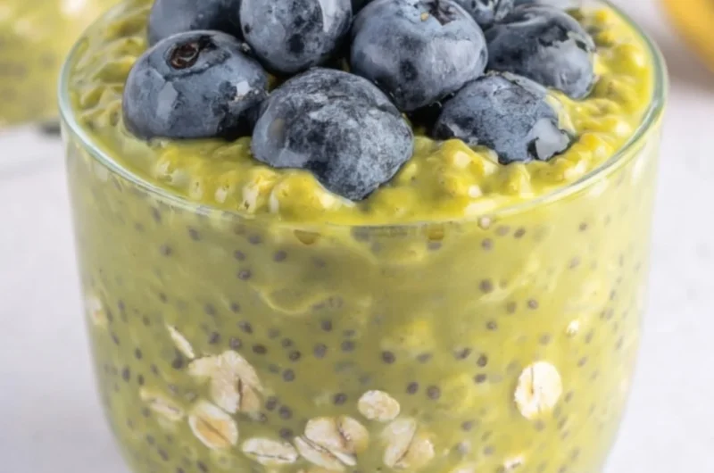 A bowl of Matcha Overnight Oats topped with fruits and nuts, a nutritious breakfast option.