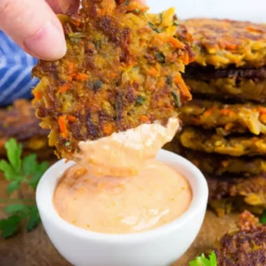 Crispy potato fritters with red lentils served on a plate