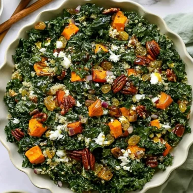 Roasted sweet potato kale salad with vibrant greens and colorful toppings
