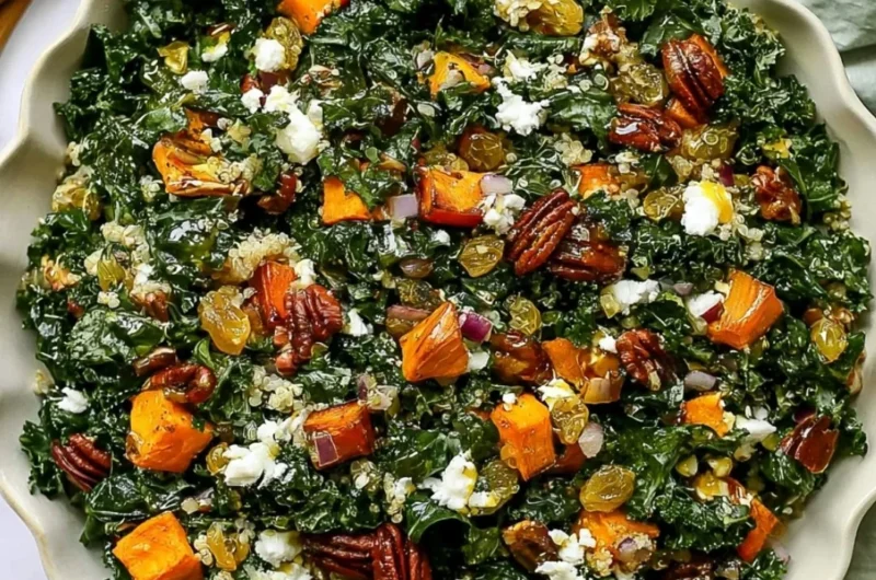 Roasted sweet potato kale salad with vibrant greens and colorful toppings