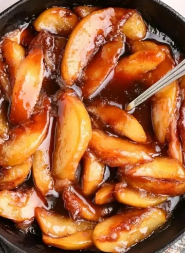 Delicious Southern fried apples served in a bowl with cinnamon and sugar