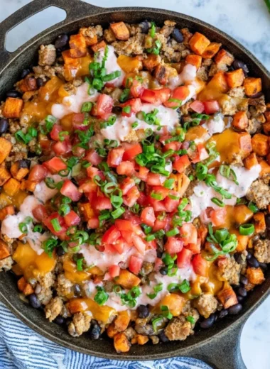 Turkey Sweet Potato Skillet with vegetables in a frying pan