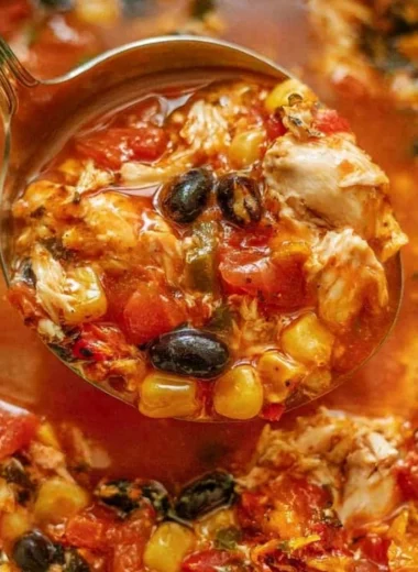 Delicious Chicken Tortilla Soup garnished with crispy tortilla strips and fresh cilantro