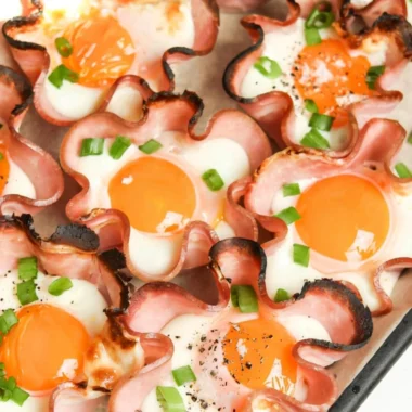 Ham and cheese egg cups baked in muffin tins for a tasty breakfast option