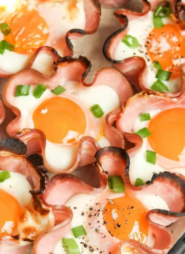 Ham and cheese egg cups baked in muffin tins for a tasty breakfast option