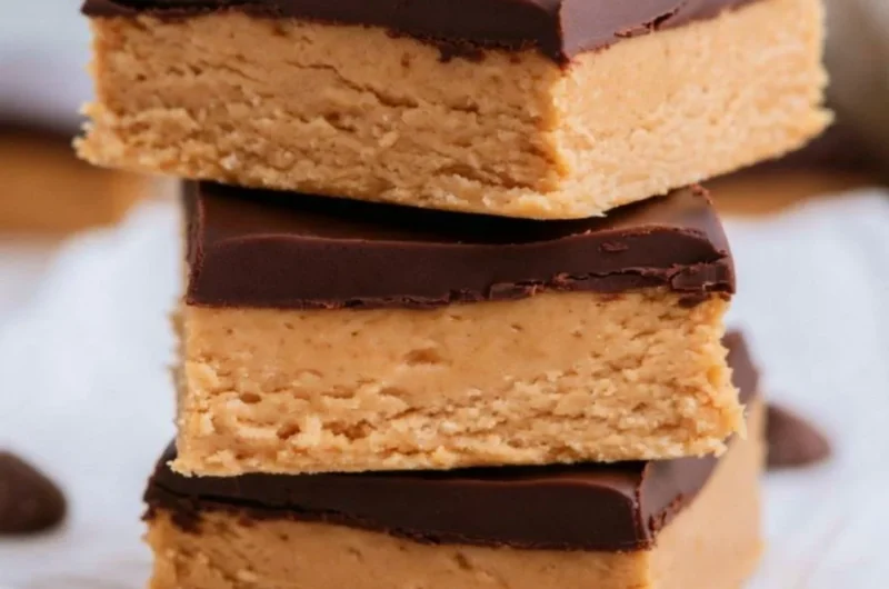 No-bake Peanut Butter Buckeye Bars topped with chocolate.
