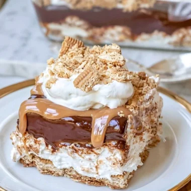 No Bake Peanut Butter Chocolate Lasagna dessert dish with layers of chocolate and peanut butter.