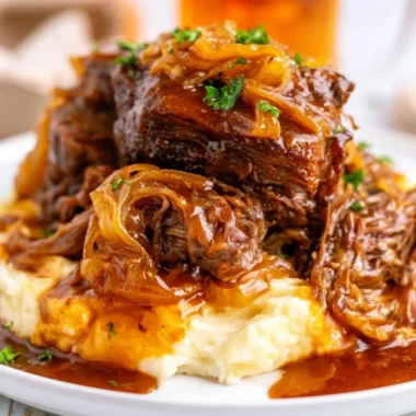 Delicious Slow Cooker French Onion Pot Roast with caramelized onions and herbs