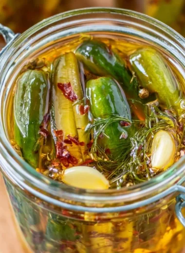 Delicious smoked pickles in a jar, offering a unique flavor twist.