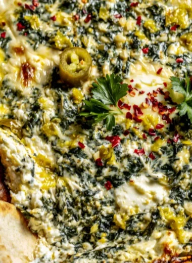 Creamy Spinach and Pepperoncini Baked Feta Dip served with pita bread.
