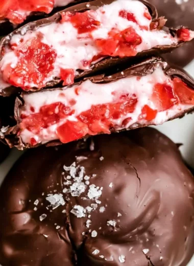 Chocolate strawberry frozen yogurt bites topped with fresh fruit.